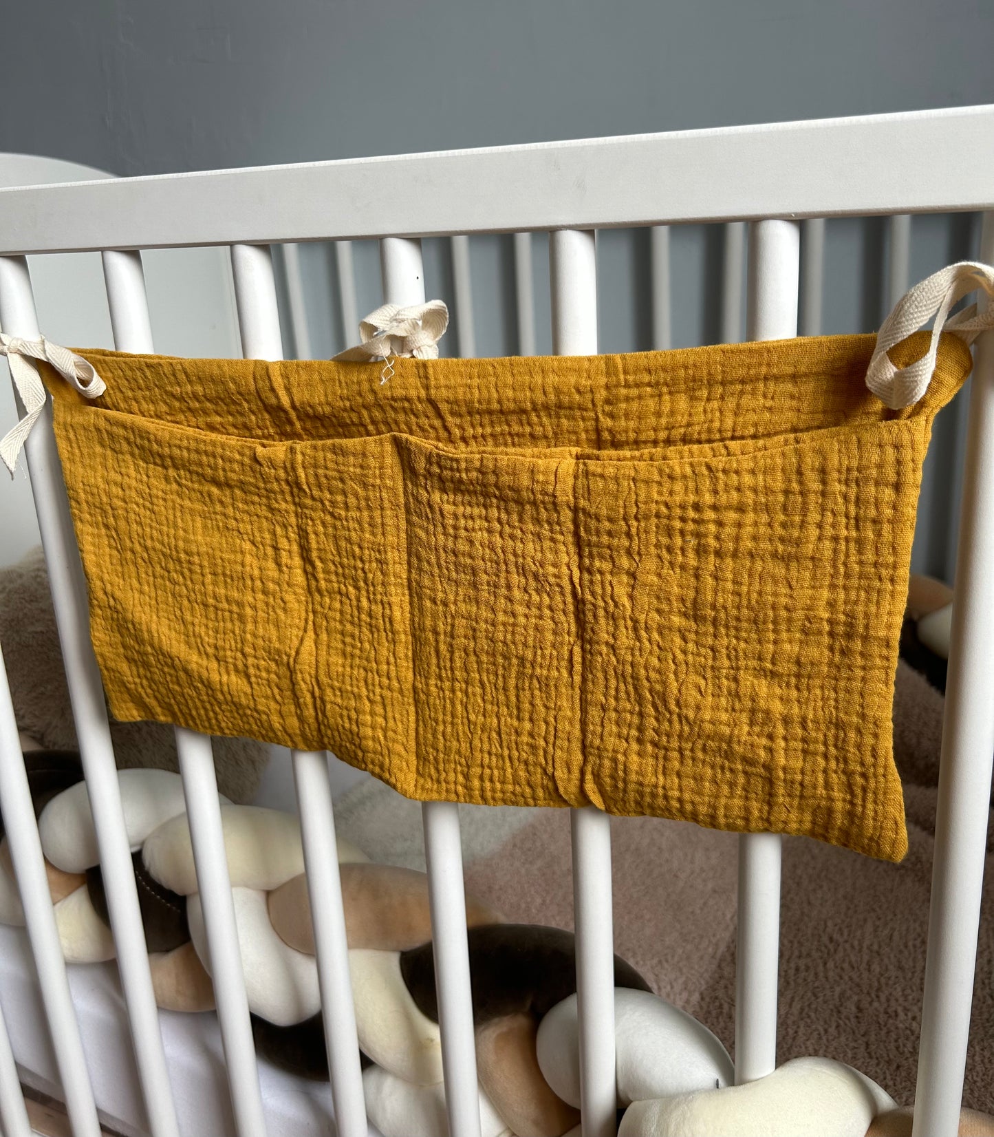 Organisateur de lit bébé