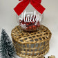 Boule de Noël avec noeux rouge