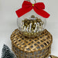 Boule de Noël avec noeux rouge